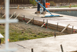 Concrete spread in backyard-Akron Concrete Pros